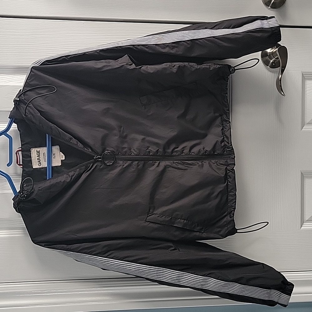 190.  Women Garage raincoat size xsmall color black and white